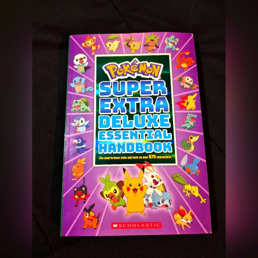 Scholastic Pokémon Handbook with Purple Cover